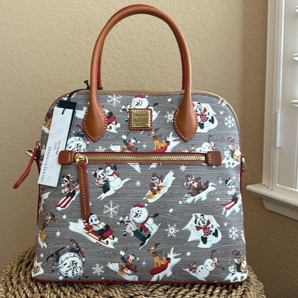 New with tags - never used! Dooney & Bourke Disney Walt’s Lodge satchel